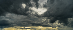 Dramatic storm clouds a dark sky