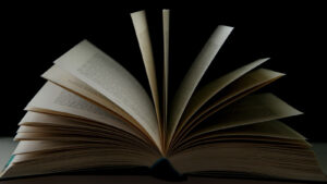 Open book against black background